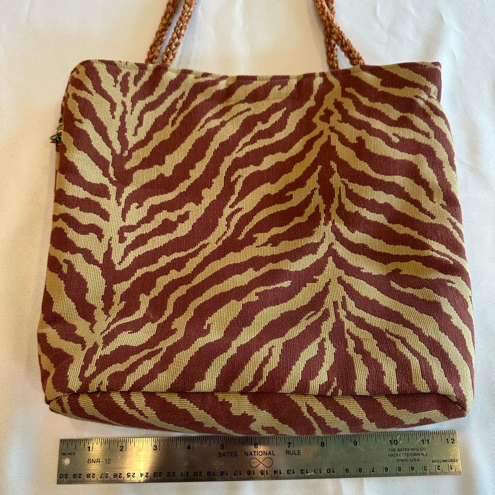 Stylish Maroon and Tan Zebra Tote Bag with Tassel Detail - Picture 6 of 10